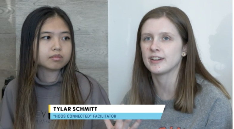 Two people being interviewed, caption says "Tylar Schmitt, 'Hoos Connected' Facilitator"