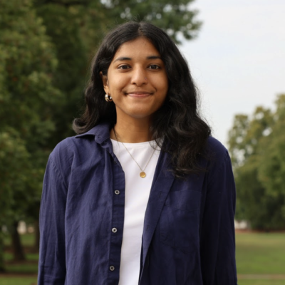 Portrait Image of Nikita Majumdar with the Lawn behind them.